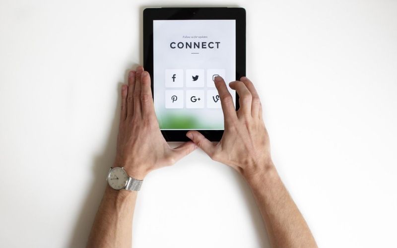 Mockup of a man using a tablet
