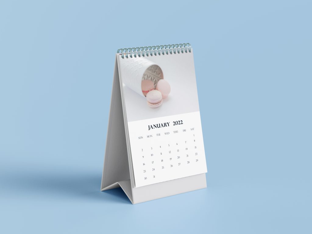 White vertical calendar mockup with a image of Macarons