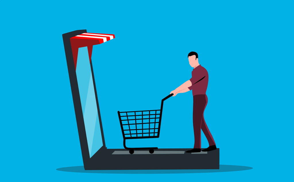 A man with a shopping cart enters the shop.