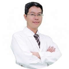 A man wearing white blazer