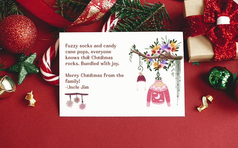 A Christmas card made using Christmas vector elements laying with other Christmas tree decorations