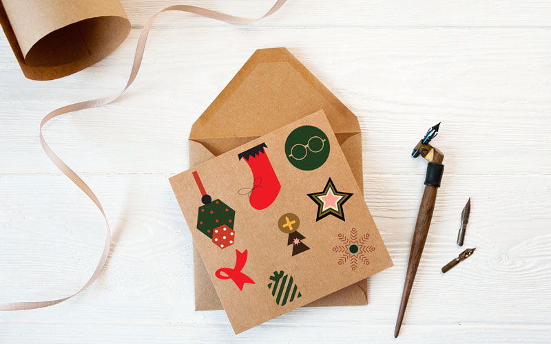 An envelope with Christmas vector designs on it for Christmas Graphics Bundle