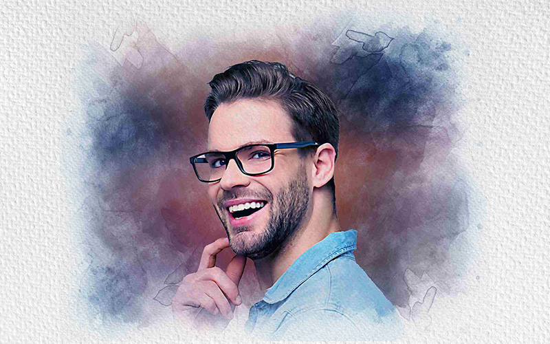 A man with a specs on smiling and a portrait effect from Photo Effects Bundle has added.