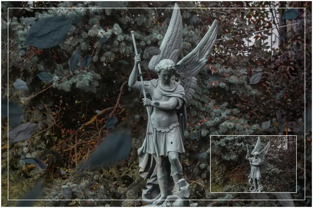 Bluish Leaves overlay effect added to an image of a statue of a winged angel holding a sphere standing in a garden.
