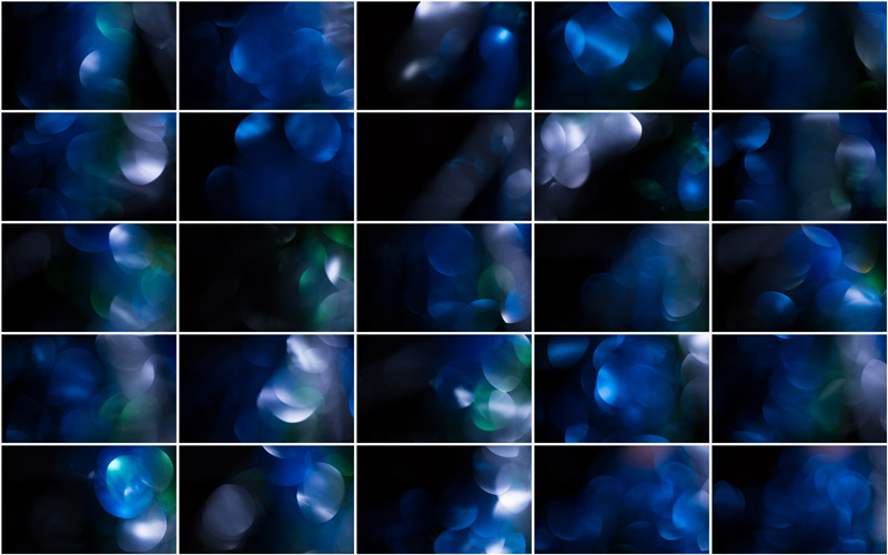 A captivating montage of shimmering green and blue bokeh, reminiscent of a lush forest.