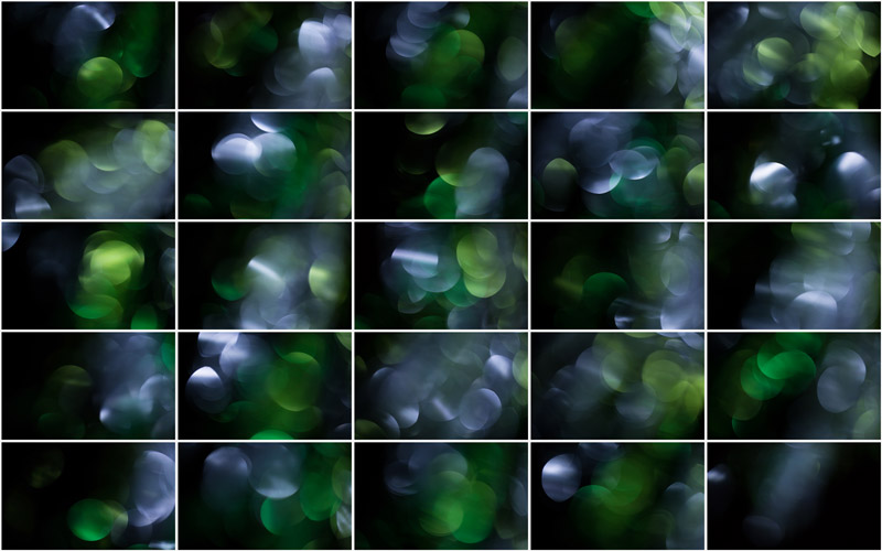 "An abstract fusion of silver and green bokeh patterns, creating a captivating and harmonious visual display."