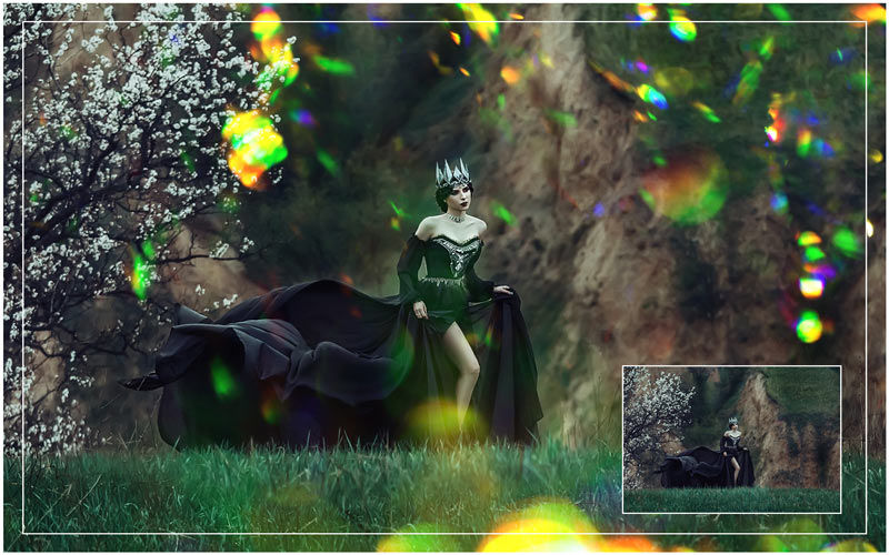 a lady in a green grown with a crown on her head running in a garden