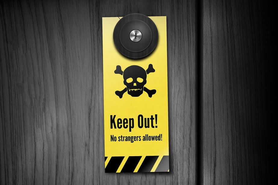 image of yellow and black colored door hanger mockup with a skull on it