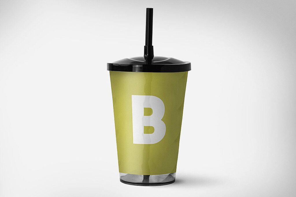 image of a yellow sipper cup with a capital b print mockup