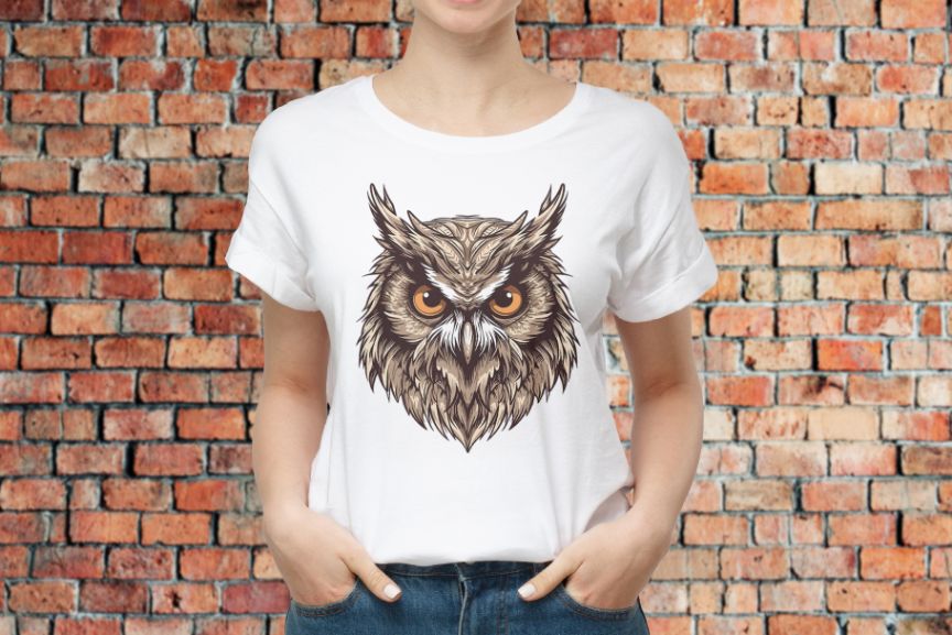 This image displays an owl's graphic printed on a t-shirt