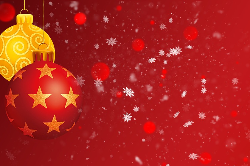 Christmas balls on a bright red background with snowflakes