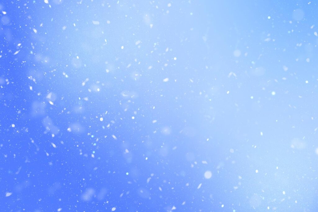 Light blue winter background with snow fall effect from winter backgrounds bundle