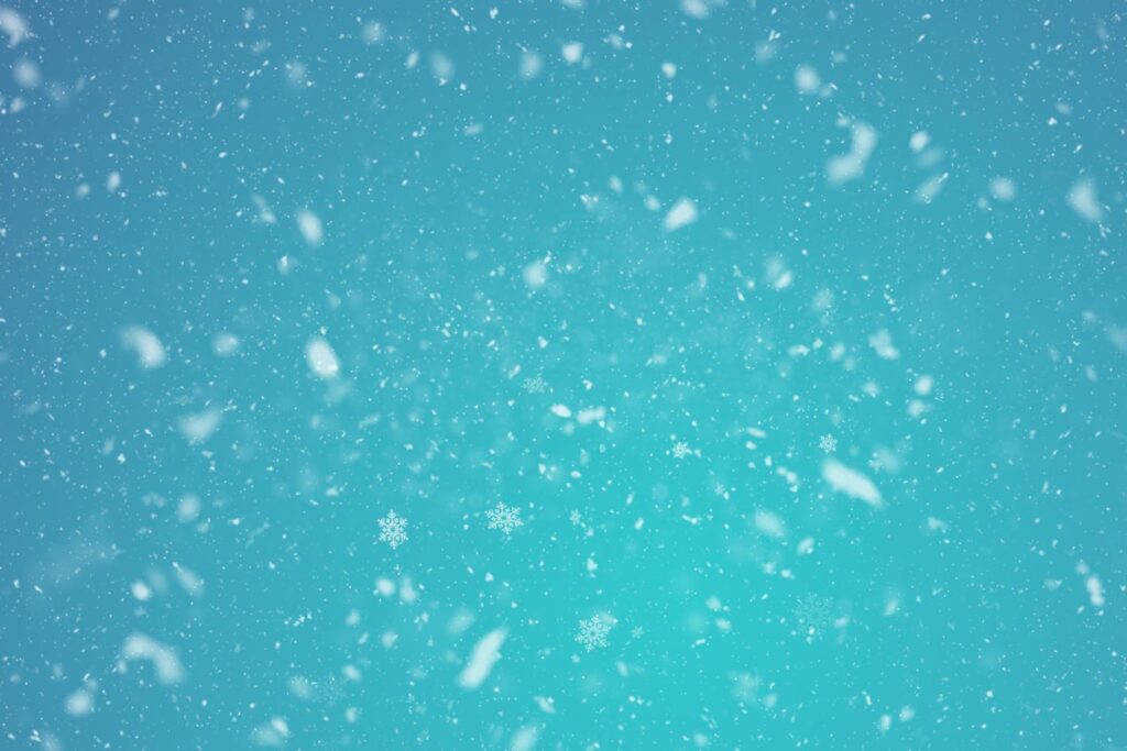 Turquoise colored winter background with snow fall effect from the winter backgrounds bundle