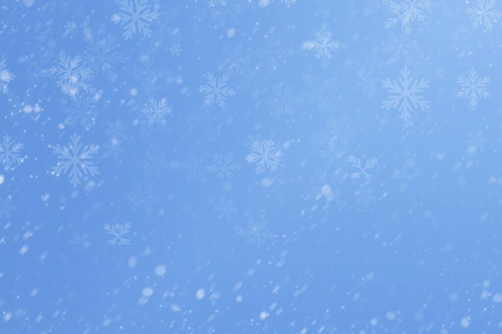Light blue background with snow flake effects
