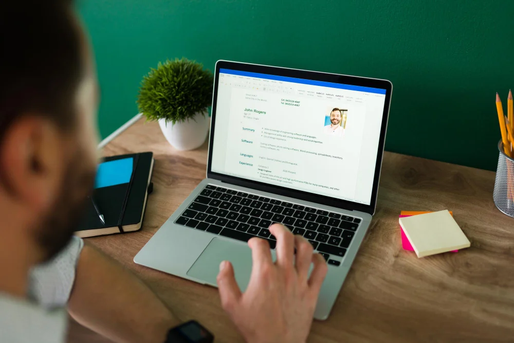 Build a personal Brand Preview showcasing a man working on a laptop