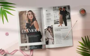 magazine mockup with pictures kept on a pink table along with a pencil