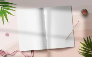 Blank Magazine mockup on a pink table with a pencil