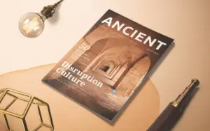 Magazine mockup with a cover on table