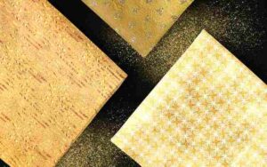 Flat lay arrangement of textured metallic papers from The Gold Backgrounds Collection.