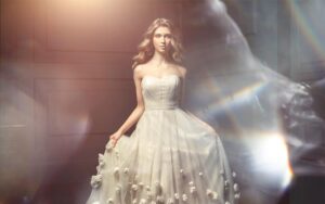 Portrait of a woman in a classic strapless ballgown with crystal prism light flares.