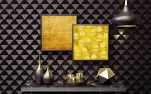 Elegant gold artwork displayed on a dark geometric wall from The Gold Backgrounds Collection.
