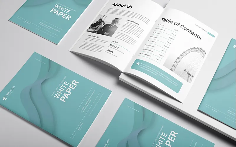 Open white paper showing About Us and contents