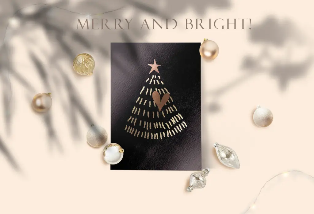 A single black card with a metallic gold, hand-drawn Christmas tree is centered on a light background.