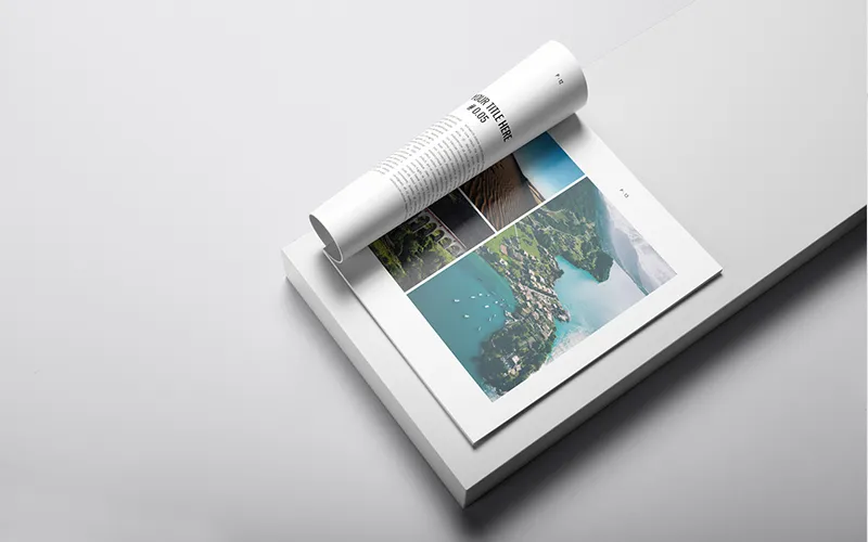 Rolled photo book showing aerial photo grid