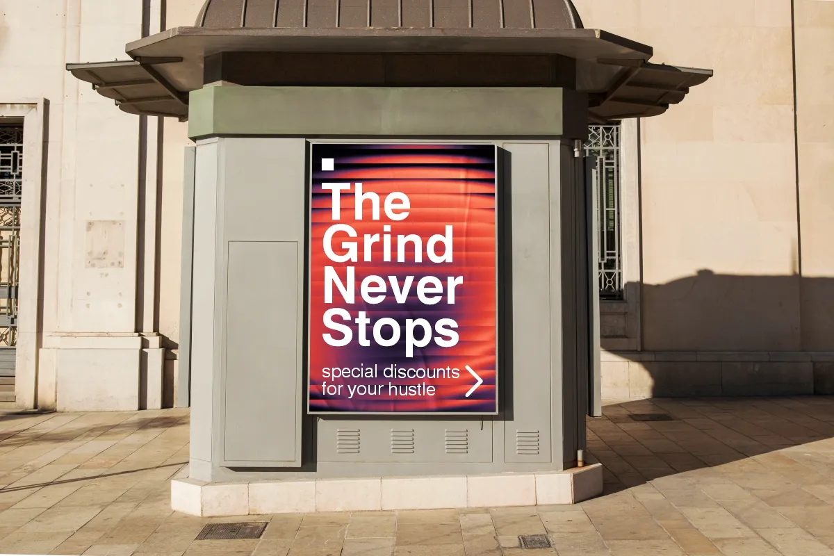 Poster mockup on a street kiosk with an orange fractal glass gradient background.