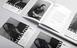 Multiple magazine mockups showing inner page layouts and cover design.