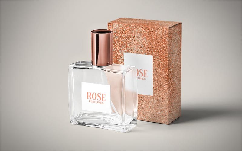 Rose gold backgrounds mockup for a perfume packaging